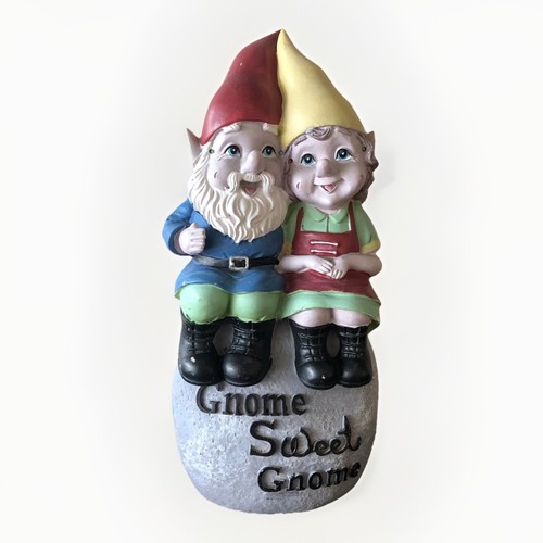 Garden gnome figurines sitting - garden,