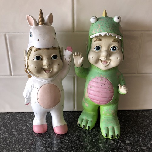 Garden gnomes dinosaur and - x,