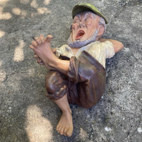 Ancient reclining garden gnome
